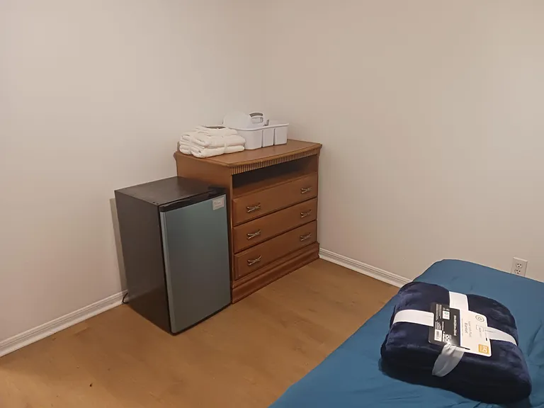 Huge reach-in closet behind you and this large dresser as well.