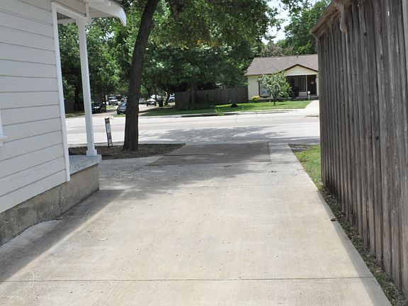 Detached garage view of the driveway