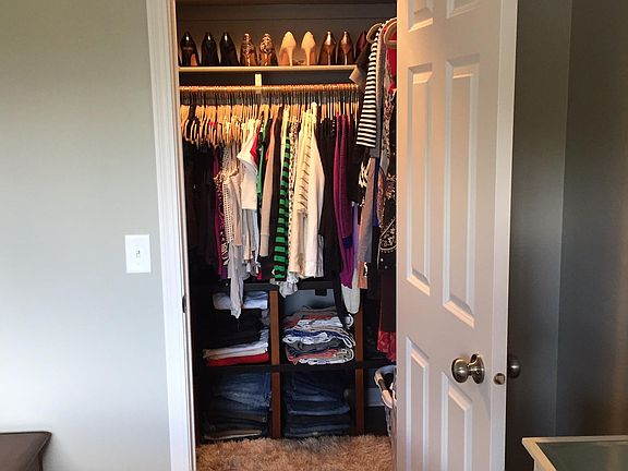 Small walk-in closet in bedroom