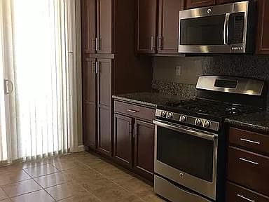 Kitchen with stainless steel appliances.