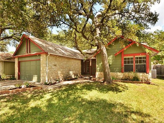 Trees provide plenty of shade over house