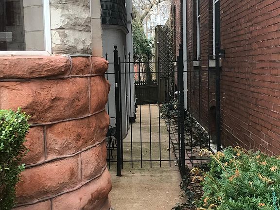 Wrought iron gate to the apartment; private and secured entrance