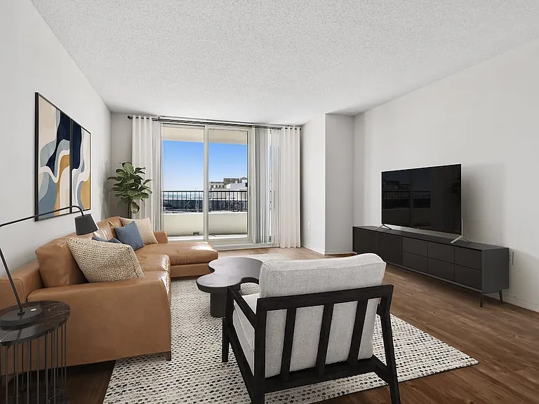 Renovated Package I living room with hard surface flooring