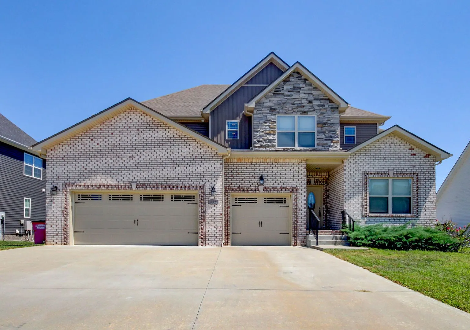 Beautiful 5-bedroom home with spacious open-concept floor plan — Photo 1