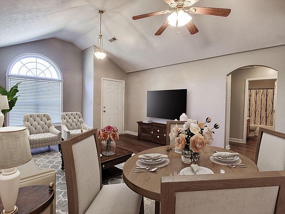 Ample light in main living area (photo virtually staged)