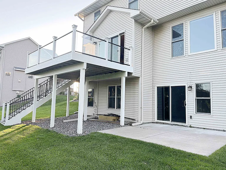 Lot of outside living space with deck and Patio - connected with Main floor and basement