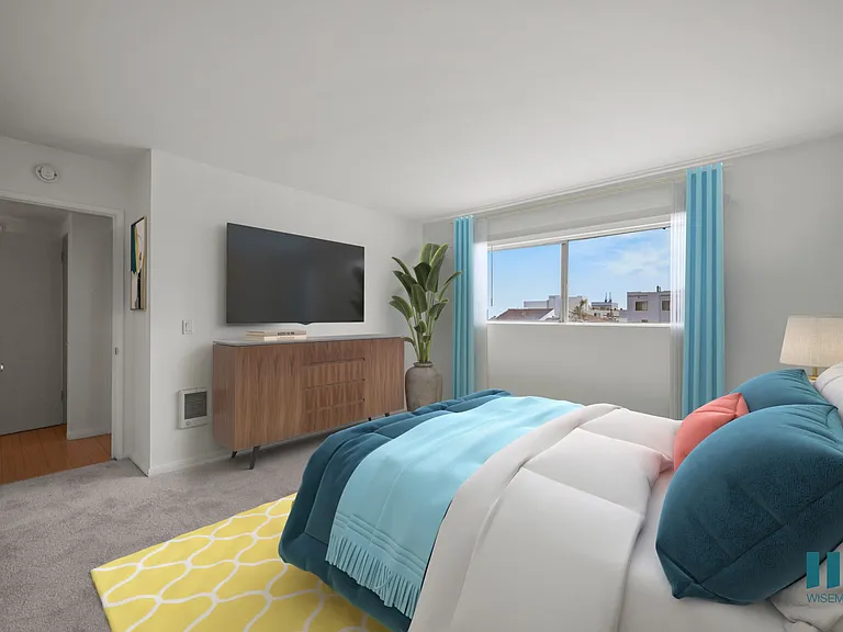 Spacious Bedroom with Windows and Carpet