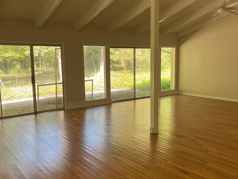 Great room with sliding doors to side patio.