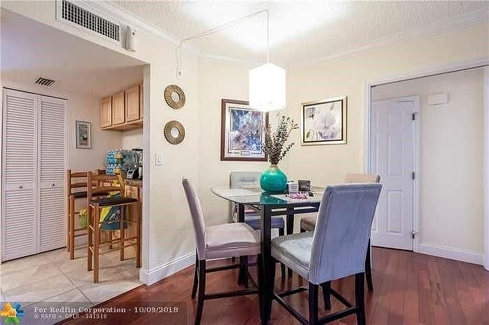 1st image of 303 Gardens Dr APT 106
