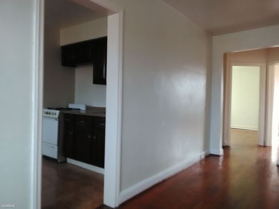 Entry into kitchen off living area.