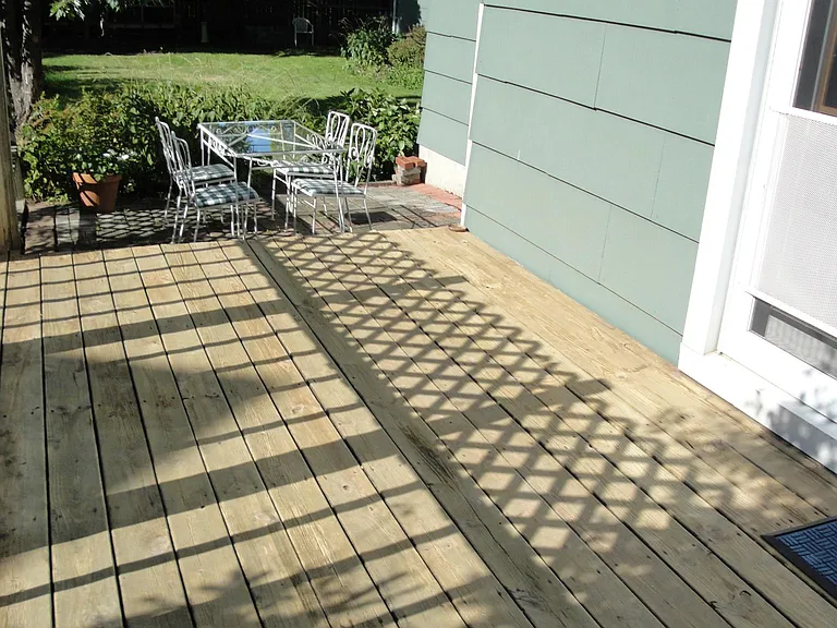 Back deck, patio, and yard