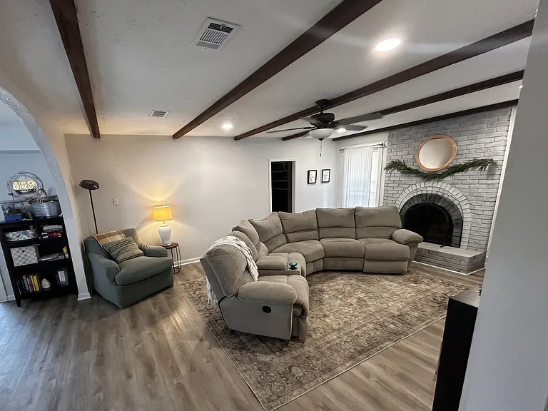 Living Room, Door in back leads to 4th Bedroom/Bonus Room)