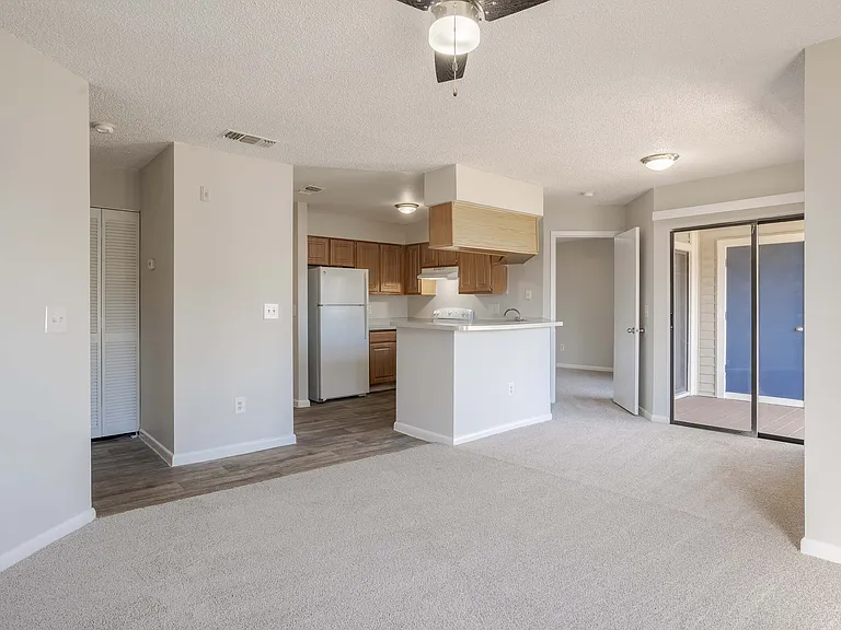 Experience modern living in this open-concept apartment with a charming kitchen and a private balcony.