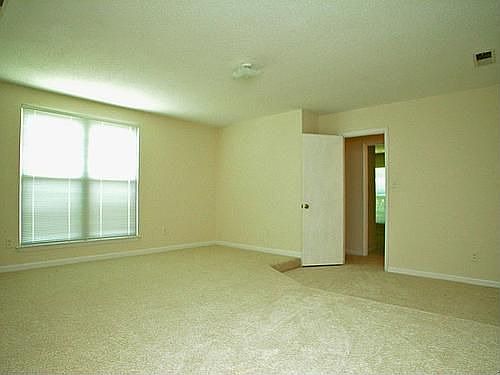 Huge Master has 2 walk-in Closets and a sunken separate seating area