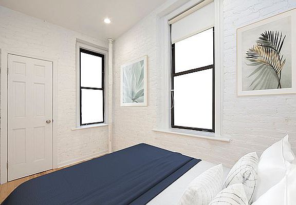 4th image of 215 E 10th St APT 6