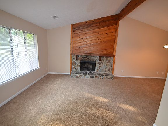 Livingroom space with vaulted ceiling