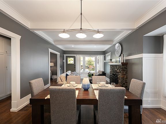 Notice the extensive trim work and boxed beam ceilings. 