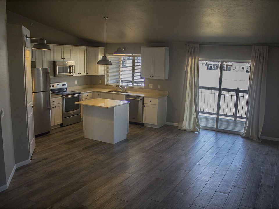 Main Area w/ view of Patio Doors and Outdoor View