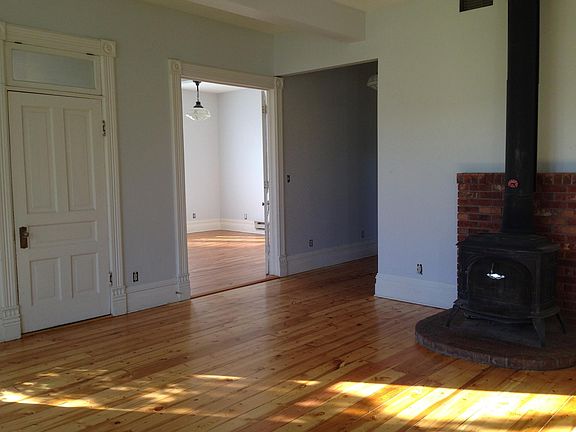 Living room looking toward west bedroom and hall to bathroom