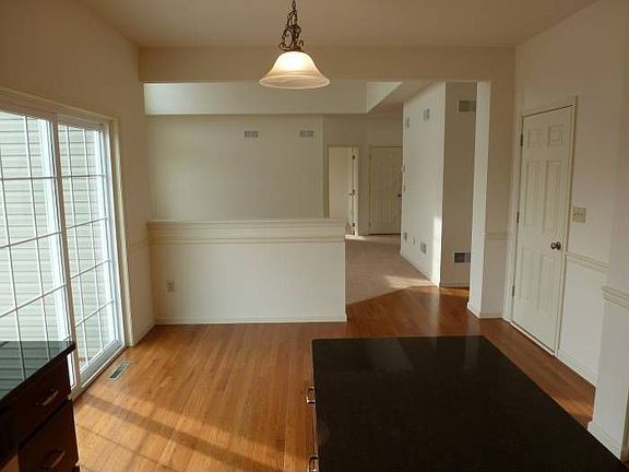 Kitchen looking into fami