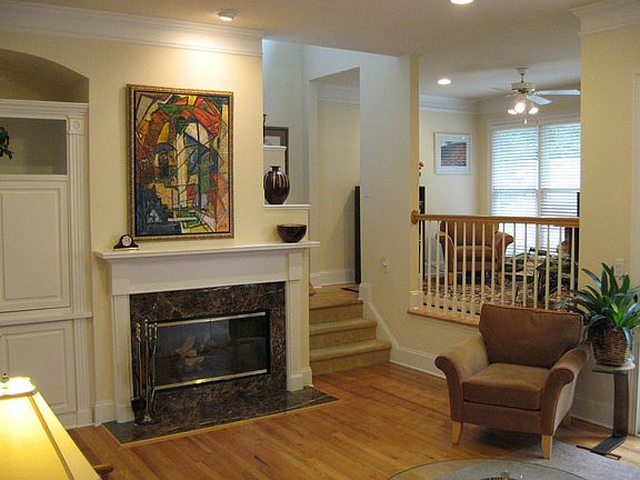 Warm, inviting fireplace and sitting loft or office.