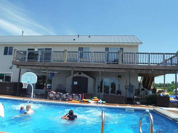 House/deck view from the pool