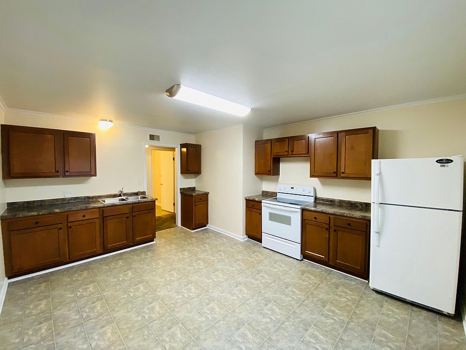 Kitchen with room for a small dining table.
