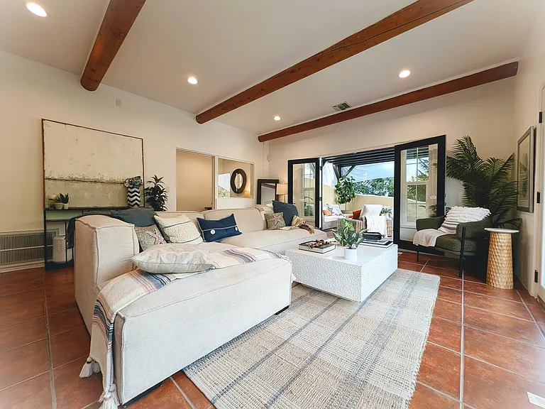 surrounded by glass doors, patios, ligh and views