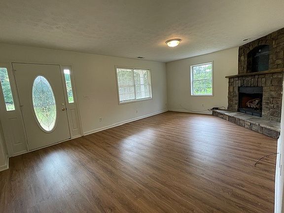 Den view showing exterior door