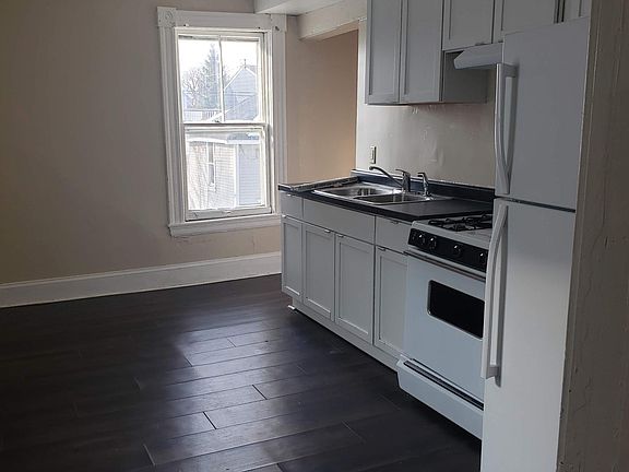 Newly renovated hardwood floor kitchen