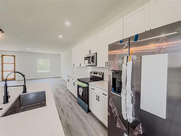 14245 SW 28th Ct — Photo 35