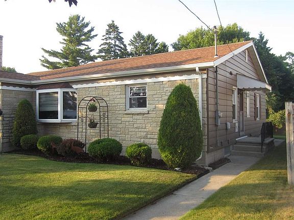 Enjoy access from kitchen to the back yard and spacious wood deck!