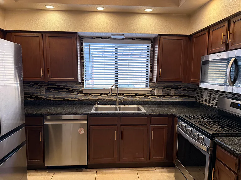 7812 Ranchwood Dr NW — Photo 2
