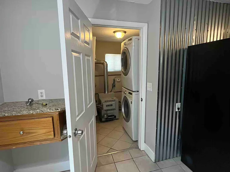 Mechanical room and door to back yard