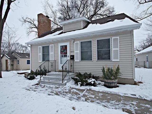 Adorable one and a half story with great curb appeal.