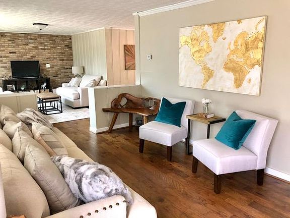 Two separate sitting areas, Living Room and Den area just off of Kitchen