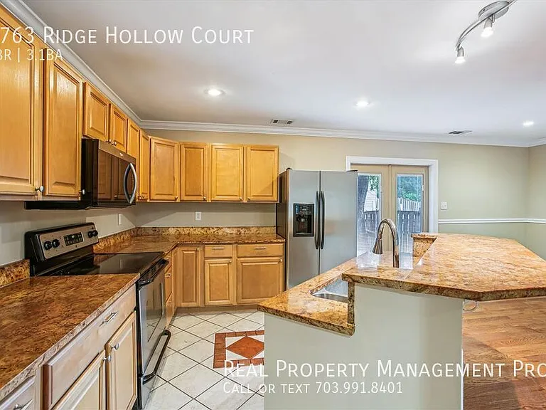8763 Ridge Hollow Ct — Photo 11