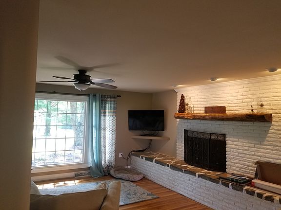 living room barn beam mantle