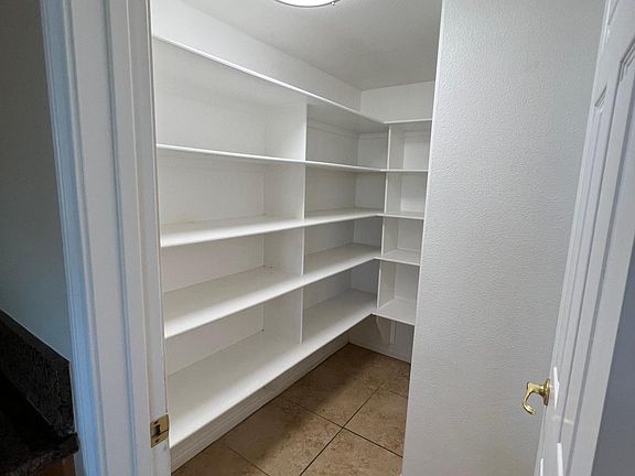 Freshly painted large pantry in the kitchen. Perfect for storage.