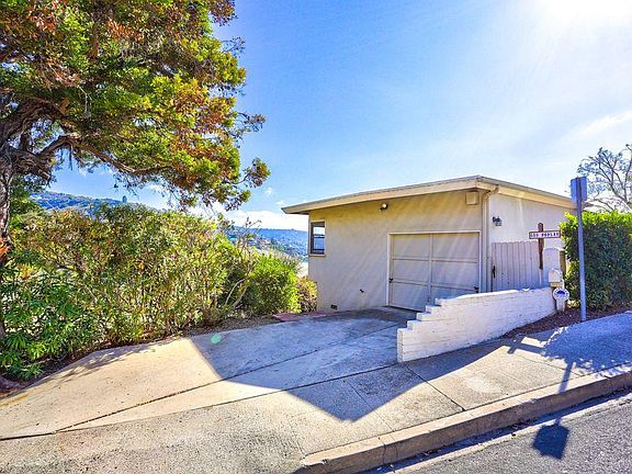 One car garage plus driveway, and the best guest parking in town, almost unheard of.