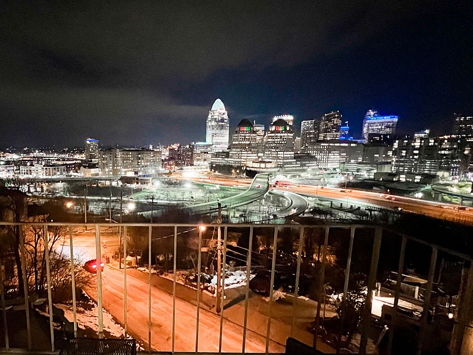 View of the beautiful city at night from the balcony of Monastery Apartments