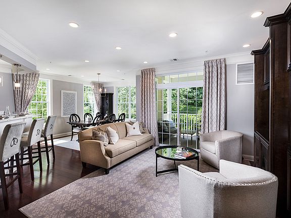 Living Room Opens to Dining and Kitchen