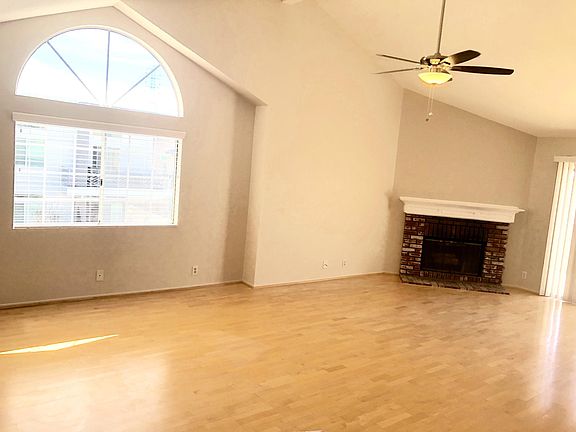 Great Room has high ceiling and lovely windows providing plenty of light