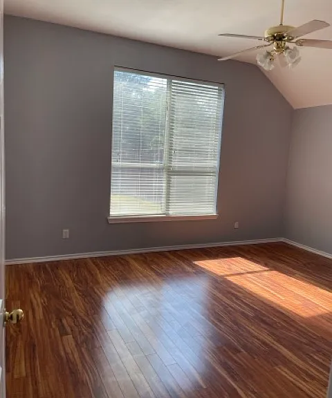 Master bedroom w/ceiling fan.