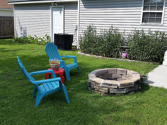 Relax by the stone firepit!