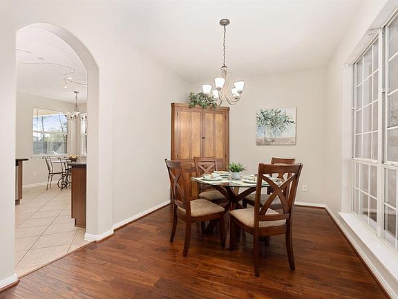 Elegant formal dining room creates a great space to gather with family and friends. Kitchen access to the left.