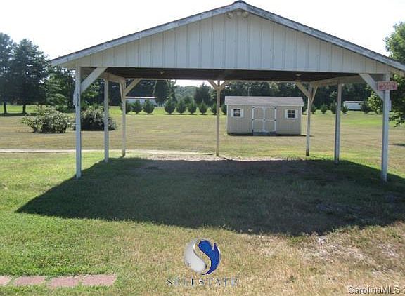Carport with electricity; lighting installed