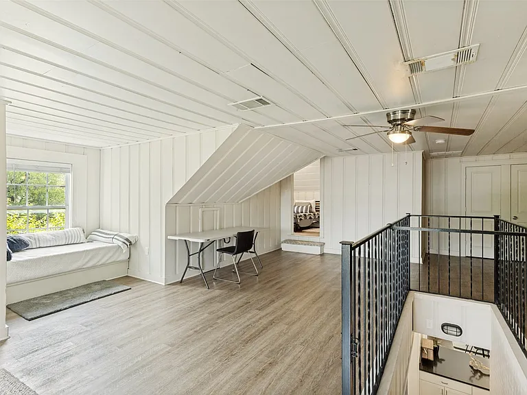 Upstairs flex space. Can be a bedroom, office, living area.