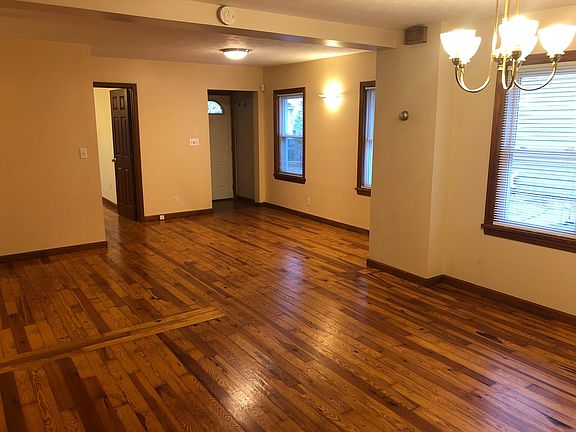 View from dining room (living room, front entrance, door to bedroom)