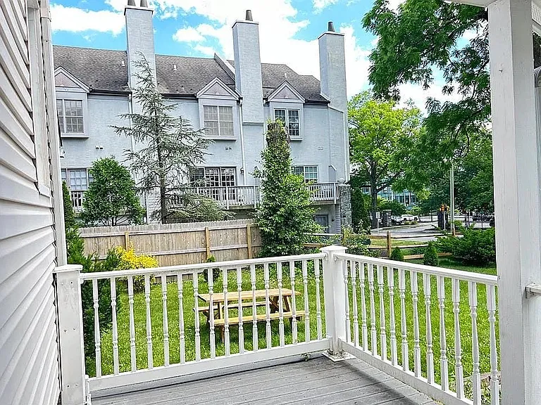Enjoy the outdoors from the covered front porch overlooking a spacious front yard.